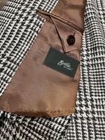 〈Brilla per il gusto〉FERLA社のツイード素材を載せたグレンプレイドジャケットを。