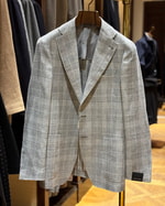 グレーのチェック〈TAGLIATORE〉