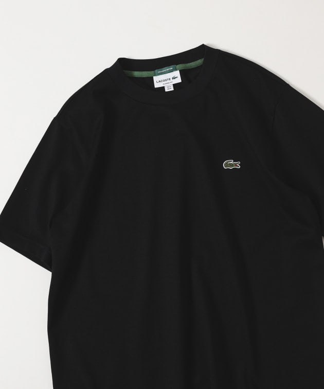 お待たせしました。〈LACOSTE（ラコステ）〉50周年別注Tシャツ、再入荷予定です