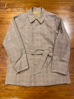 Between blouson and coat.