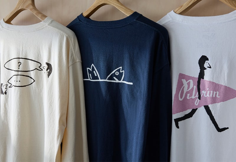 Jean Jullien〉の描き下ろしたグラフィックの別注ウェアを