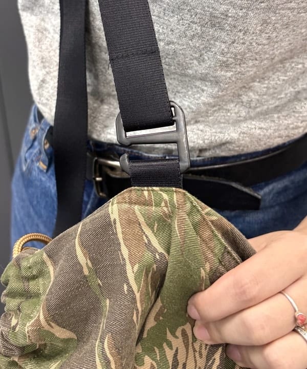 かわい みづきさんの「【別注】N,P,E / ペイシェント バッグ カモ L」を使ったコーディネート